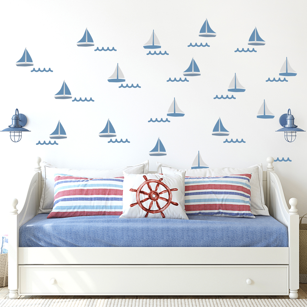 blaue Segelboote Wandtattoo über Bett