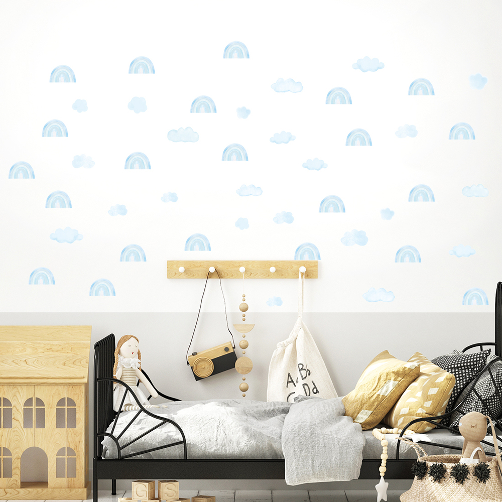 blaues mini Regenbögen Wandtattoo über Bett