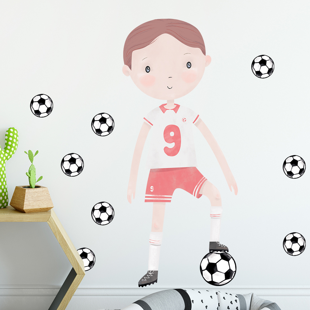 Wandaufkleber Motiv roter Fußballspieler