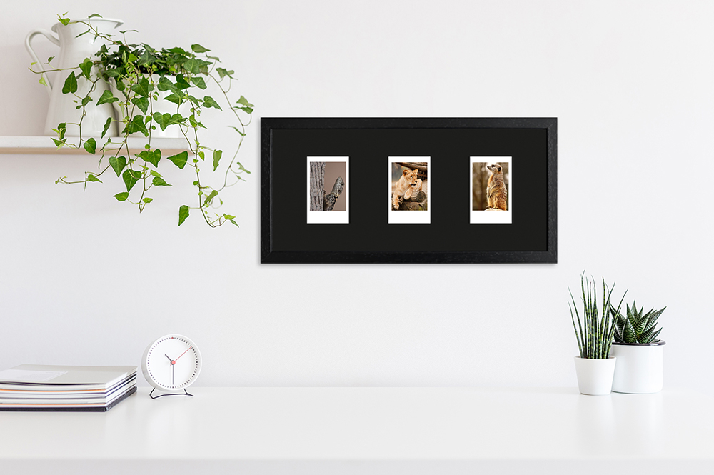 schwarzer Instax Mini Rahmen für drei Bilder helle und moderne Einrichtung mit schwarzem Fotorahmen