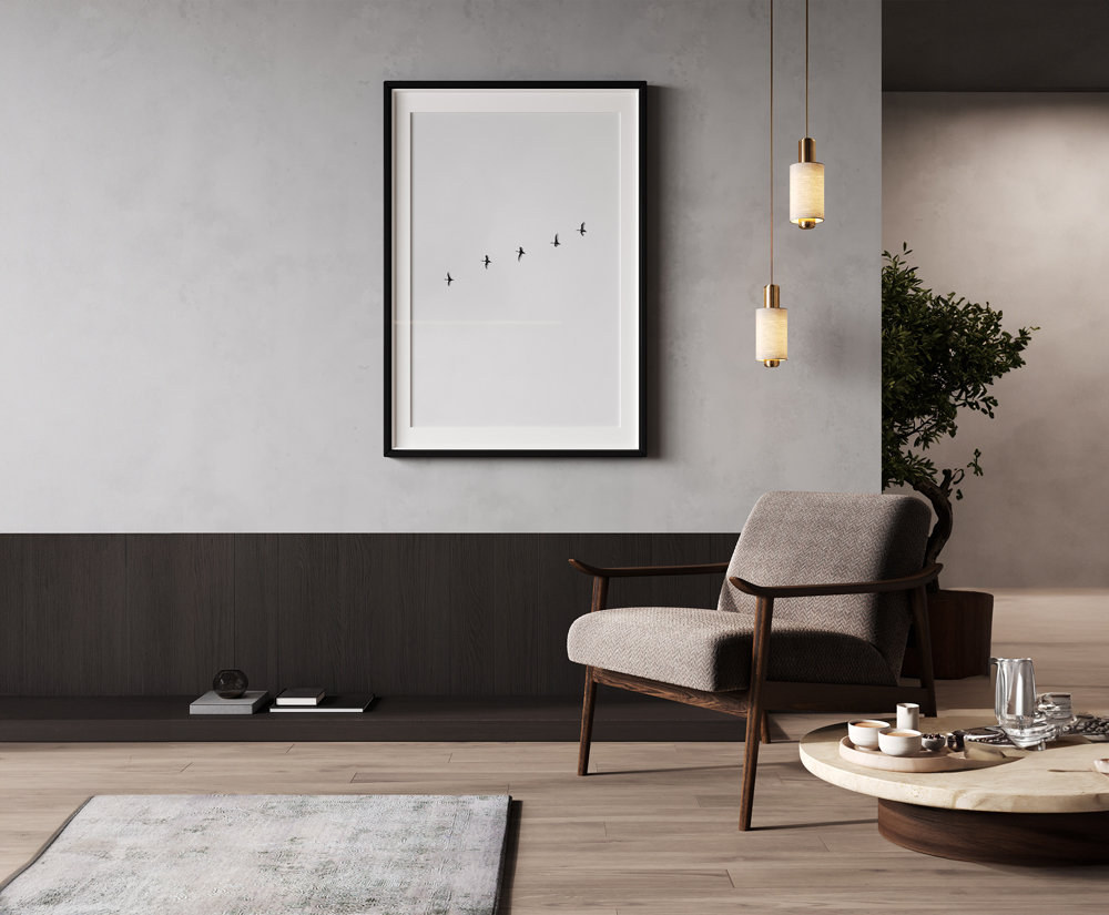 Modernes Wohnzimmer mit Bilderrahmen Wohnzimmer mit grauen Wänden und einem Sessel