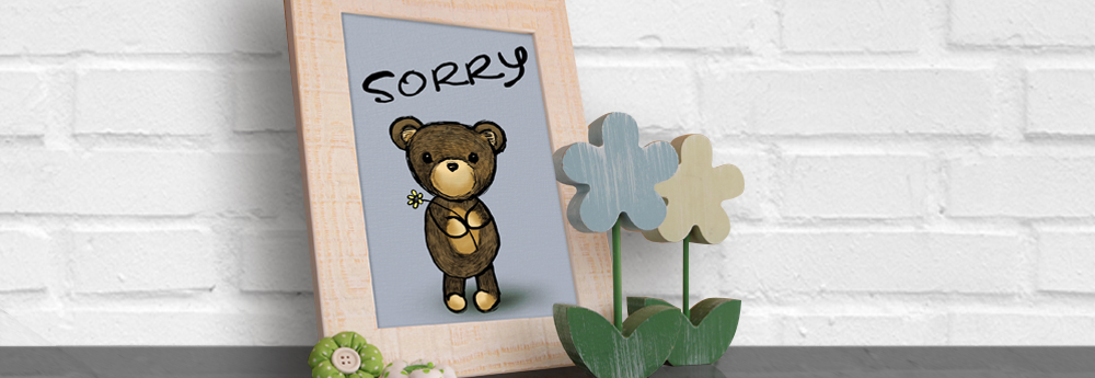 eingerahmtes Bild zur Entschuldigung Bild eines Bären mit Blumen zur Entschuldigung