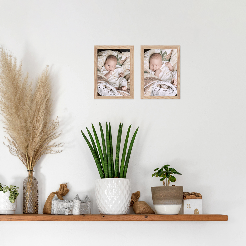 2er 15x21 Bilderrahmen-Set in Eiche an Wohnzimmerwand