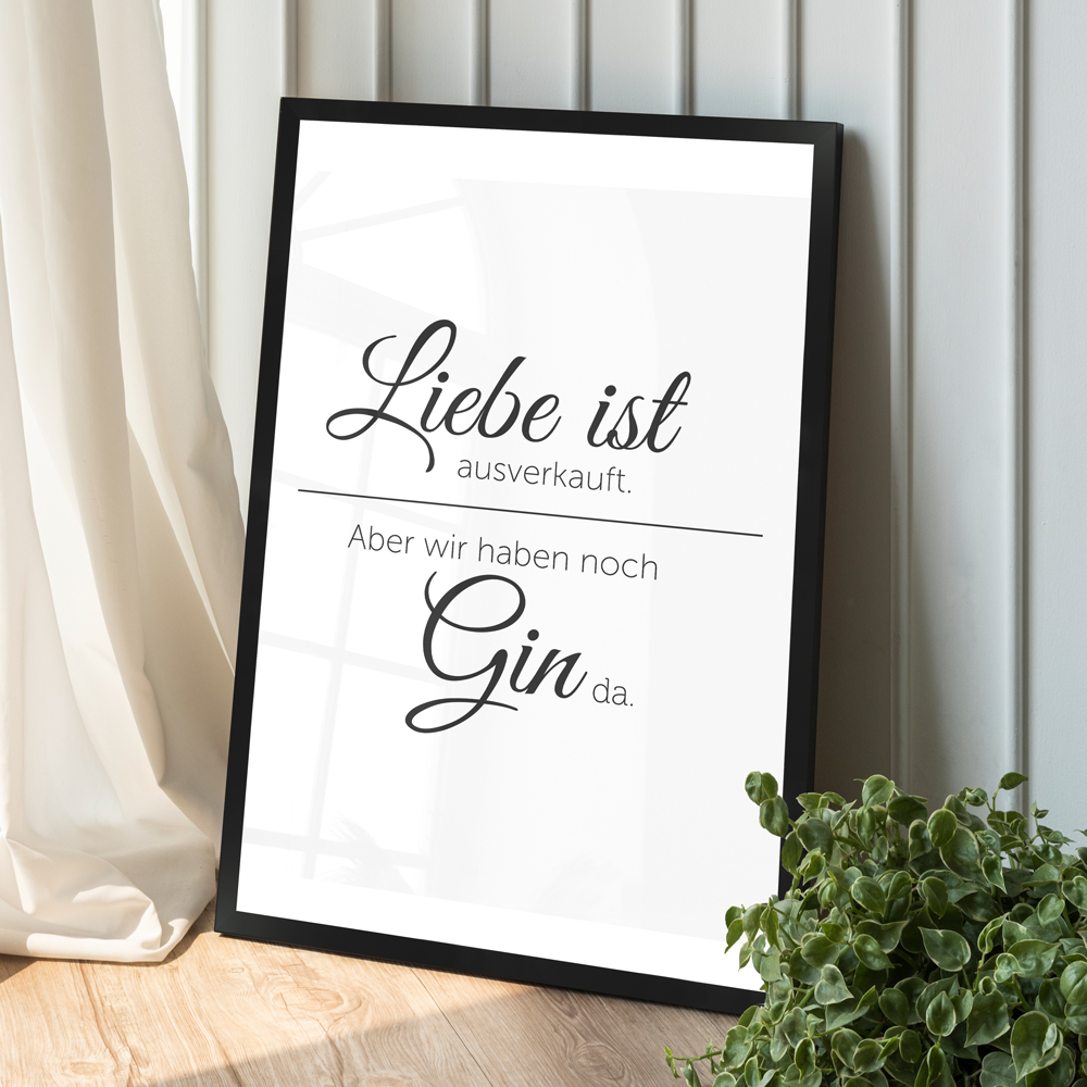 Dekoration weißes Poster "Liebe ist ausverkauft" in schwarzem Holzrahmen