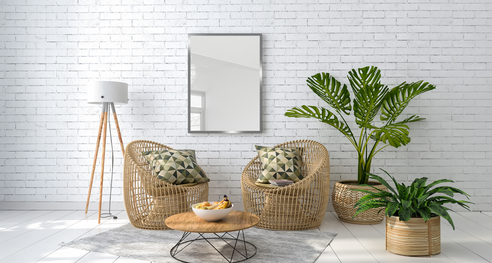 Sitzecke dekoriert Sitzecke mit Pflanzen und einem Spiegel in silber